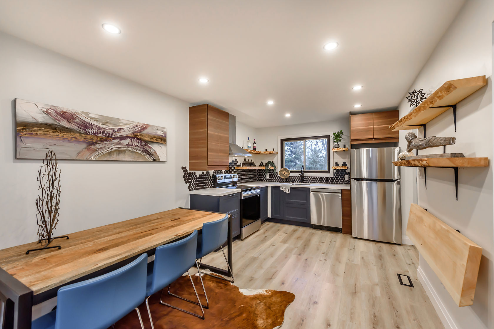 Professional wide-angle finished kitchen with warm wood tones and clean staging — premium portfolio shot — Gateshead, Hamilton | MTC Renovations